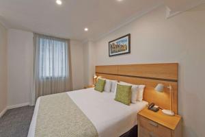 Vuode tai vuoteita majoituspaikassa Quality Apartments Adelaide Central