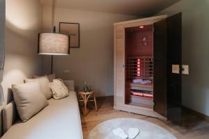 Posezení v ubytování La Merveilleuse by Infiniti hôtel