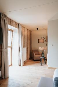 Posezení v ubytování La Merveilleuse by Infiniti hôtel