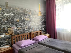 A bed or beds in a room at Guest House Demma