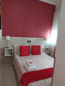 Łóżko lub łóżka w pokoju w obiekcie Hostal Inn Madrid