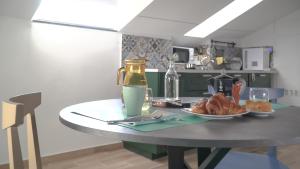 Кухня или мини-кухня в Via Garibaldi 75 - Attic sea view

