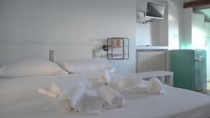 Кровать или кровати в номере Via Garibaldi 75 - Attic sea view