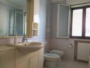 Kúpeľňa v ubytovaní Residenza Silvestro a 2 minuti dalla fiera e dal mare!