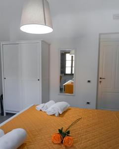 A bed or beds in a room at La Terrazza Azzurra