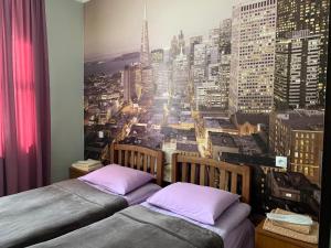 A bed or beds in a room at Guest House Demma