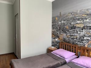 A bed or beds in a room at Guest House Demma