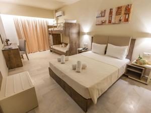 Voodi või voodid majutusasutuse Harmony Rethymno Beach toas