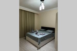 Postel nebo postele na pokoji v ubytování sheraton blaza 101 + 28 fotografií