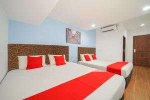 Postel nebo postele na pokoji v ubytování JMA FERRINGHI BEACH HOTEL