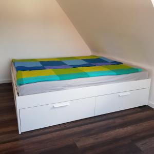 Una cama o camas en una habitación de Ostseetraum