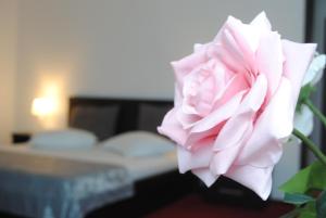Postel nebo postele na pokoji v ubytování Hotel Corona