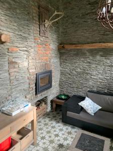 TV a/nebo společenská místnost v ubytování B&B Le Nid d'Hirondelle