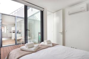 Posteľ alebo postele v izbe v ubytovaní Charming house with terrace in Lisbon.WIFI.