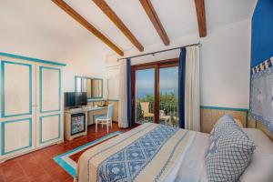 Postel nebo postele na pokoji v ubytování Il Borgo BagaBaga - Exclusive Country Retreat