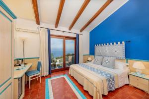 Postel nebo postele na pokoji v ubytování Il Borgo BagaBaga - Exclusive Country Retreat