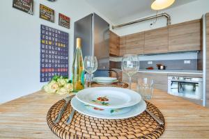 A kitchen or kitchenette at Il SOLE HOUSE