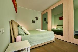 A bed or beds in a room at Il SOLE HOUSE Még 22 kép