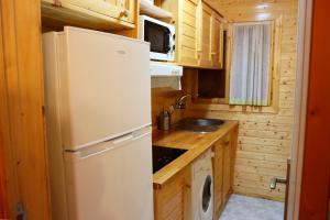 Kuchnia lub aneks kuchenny w obiekcie MI CASA DE MADERA