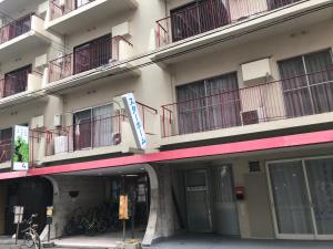 大阪市にあるDo ARITAの外に自転車を停めた建物