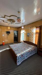 Säng eller sängar i ett rum på Dilaram Guest House