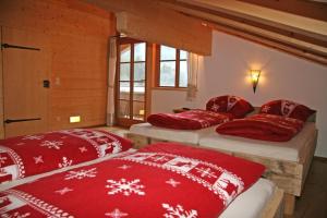 Ένα ή περισσότερα κρεβάτια σε δωμάτιο στο Ferienwohnungen Anni im Paradies