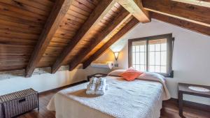 Ένα ή περισσότερα κρεβάτια σε δωμάτιο στο Casa Los Valles Alozaina by Ruralidays