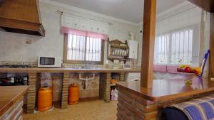 A kitchen or kitchenette at Casa Tejo Sedella by Ruralidays
