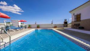 The swimming pool at or close to Casa Tejo Sedella by Ruralidays