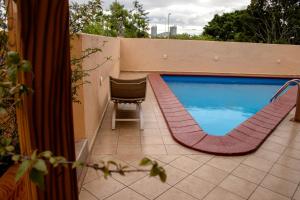 Bazén v ubytování Hotel Santa Irene Guadalajara nebo v jeho okolí