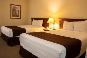 Postel nebo postele na pokoji v ubytování Hotel Santa Irene Guadalajara