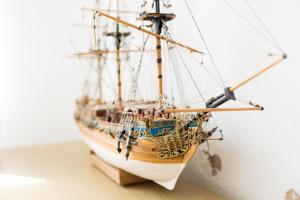 a model of a ship sitting on a table at Contemporary Home in Friendly Easton, Free Parking in Bristol
