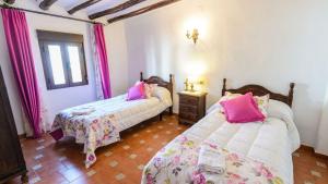 Postel nebo postele na pokoji v ubytování Casa Carmela Priego de Cordoba by Ruralidays