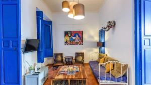 A television and/or entertainment centre at Villa El Patio Andaluz Velez-Malaga by Ruralidays