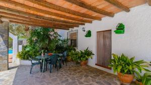 Patio alebo iná vonkajšia časť ubytovania Cortijo Lalo Orgiva by Ruralidays