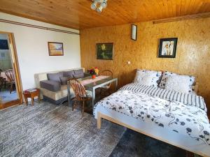 Postel nebo postele na pokoji v ubytování Apartments Panda