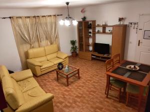 Televízia a/alebo spoločenská miestnosť v ubytovaní Casa completa en La Laguna Vivienda Vacacional