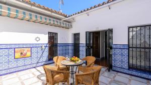 a dining room with a table and chairs at Casa El Torero El Bosque by Ruralidays in El Bosque