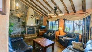 Khu vực ghế ngồi tại Finca Higueron Competa by Ruralidays