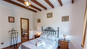 Posteľ alebo postele v izbe v ubytovaní Casa La Encina Alora by Ruralidays