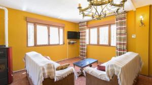Televízia a/alebo spoločenská miestnosť v ubytovaní Casita De Rufo Cenes de la Vega by Ruralidays