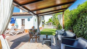 Ein Sitzbereich in der Unterkunft Casa La Vina del Arenal Pizarra by Ruralidays