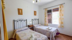Postel nebo postele na pokoji v ubytování Casa La Choza de Mamuyo Montefrio by Ruralidays