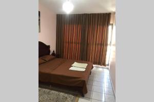 En eller flere senge i et værelse på Appartement avenue Hassan 2 guest friendly