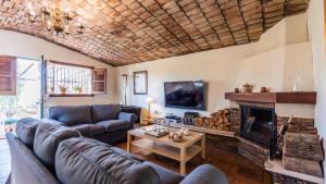 TV a/nebo společenská místnost v ubytování Casa Cupiana Malaga by Ruralidays