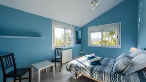 Postel nebo postele na pokoji v ubytování Casa Cupiana Malaga by Ruralidays