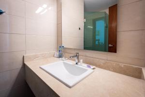 Koupelna v ubytování Imperla Hotel