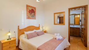 Posteľ alebo postele v izbe v ubytovaní Casa El Mirador Iznajar by Ruralidays + 26 fotografií