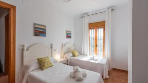 A bed or beds in a room at Casa Mari de Almogia by Ruralidays Még 24 kép