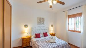 A bed or beds in a room at Casa Mari de Almogia by Ruralidays